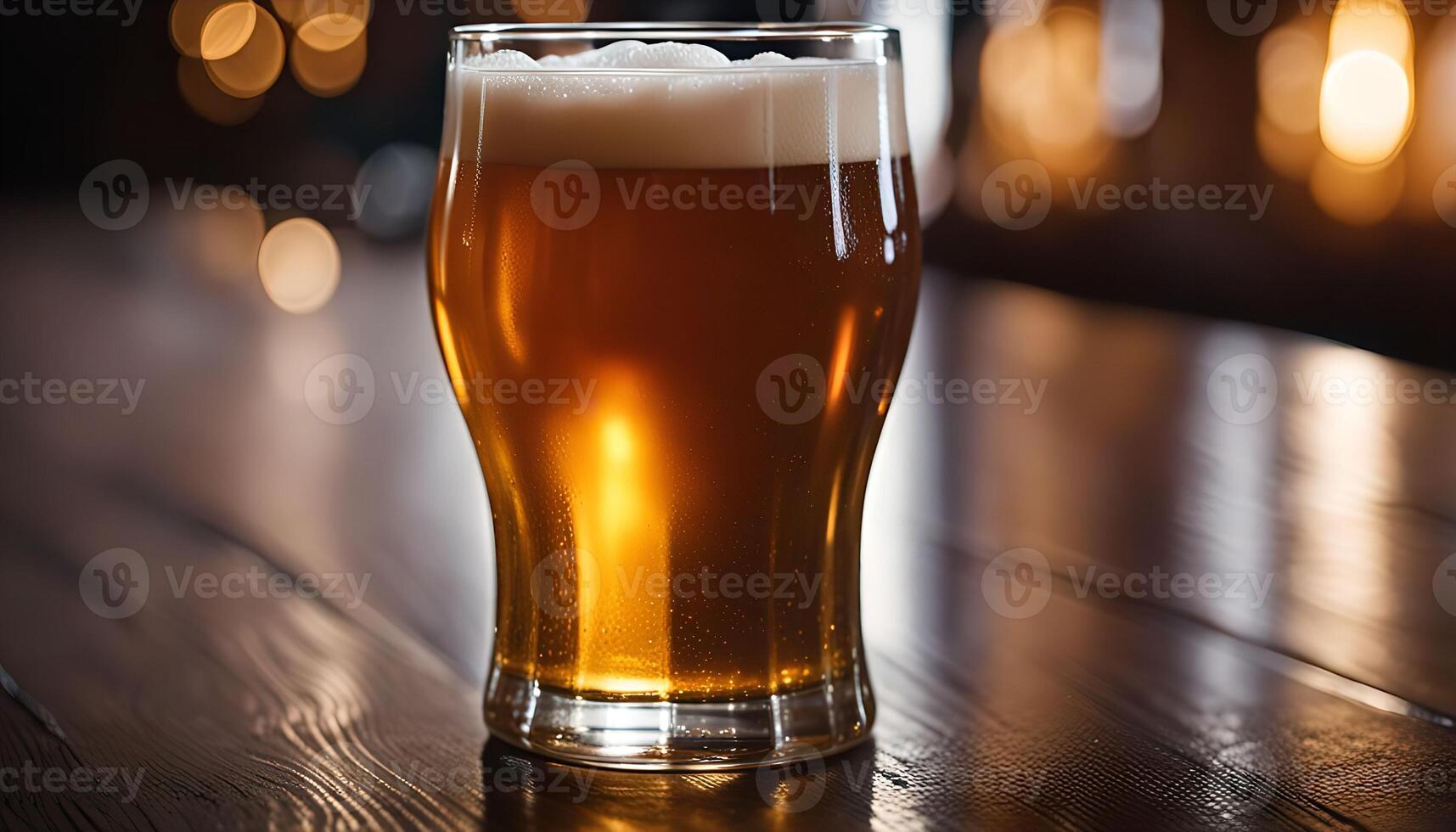 A Glass of Beer on a Wooden Table photo
