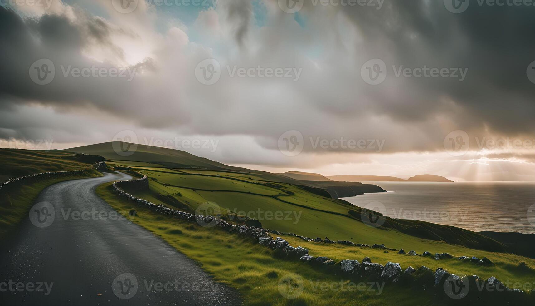 Serene Country Road Winding Through Rolling Hills Towards the Ocean photo