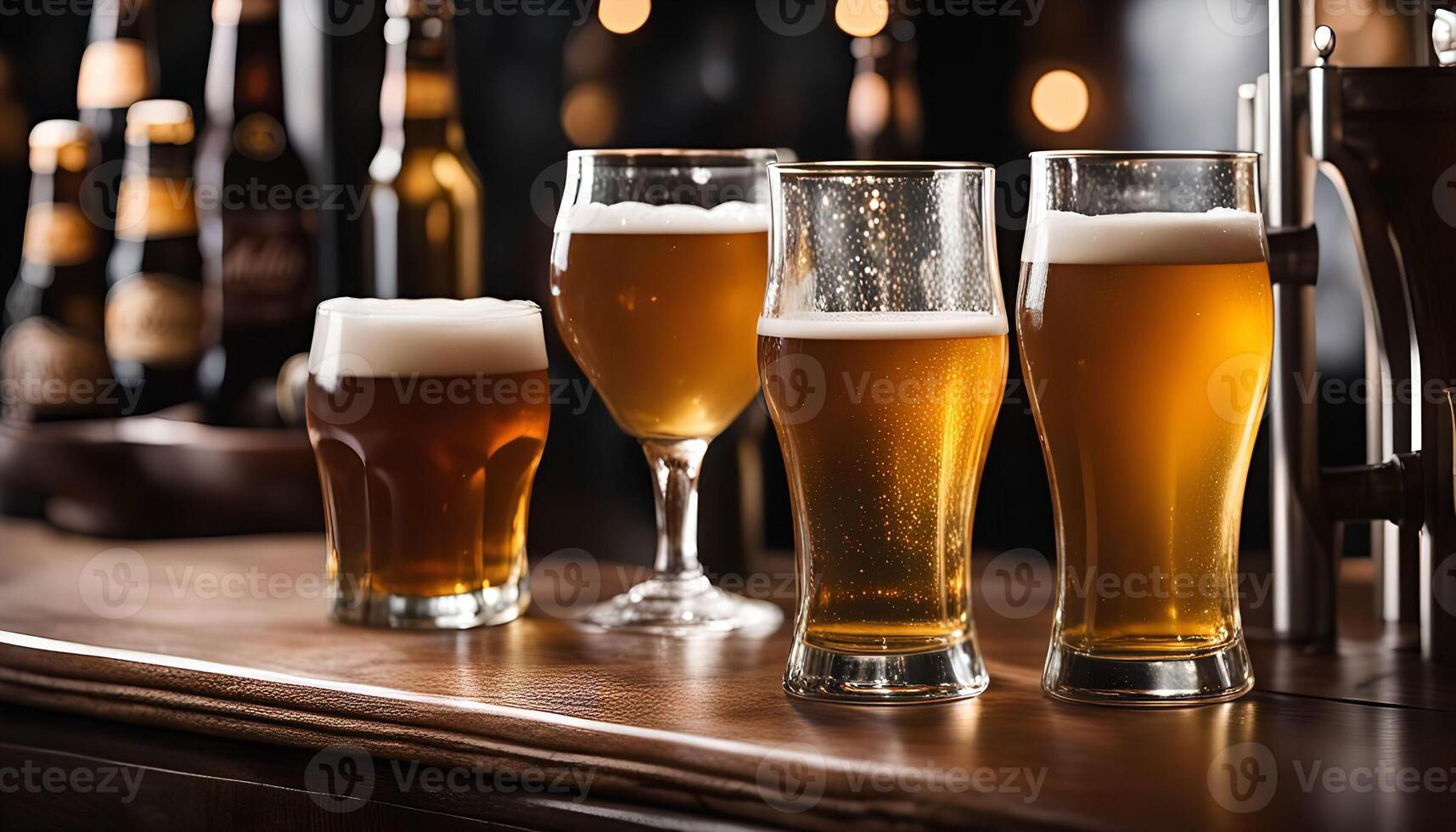 Four Glasses of Beer on a Bar Counter photo