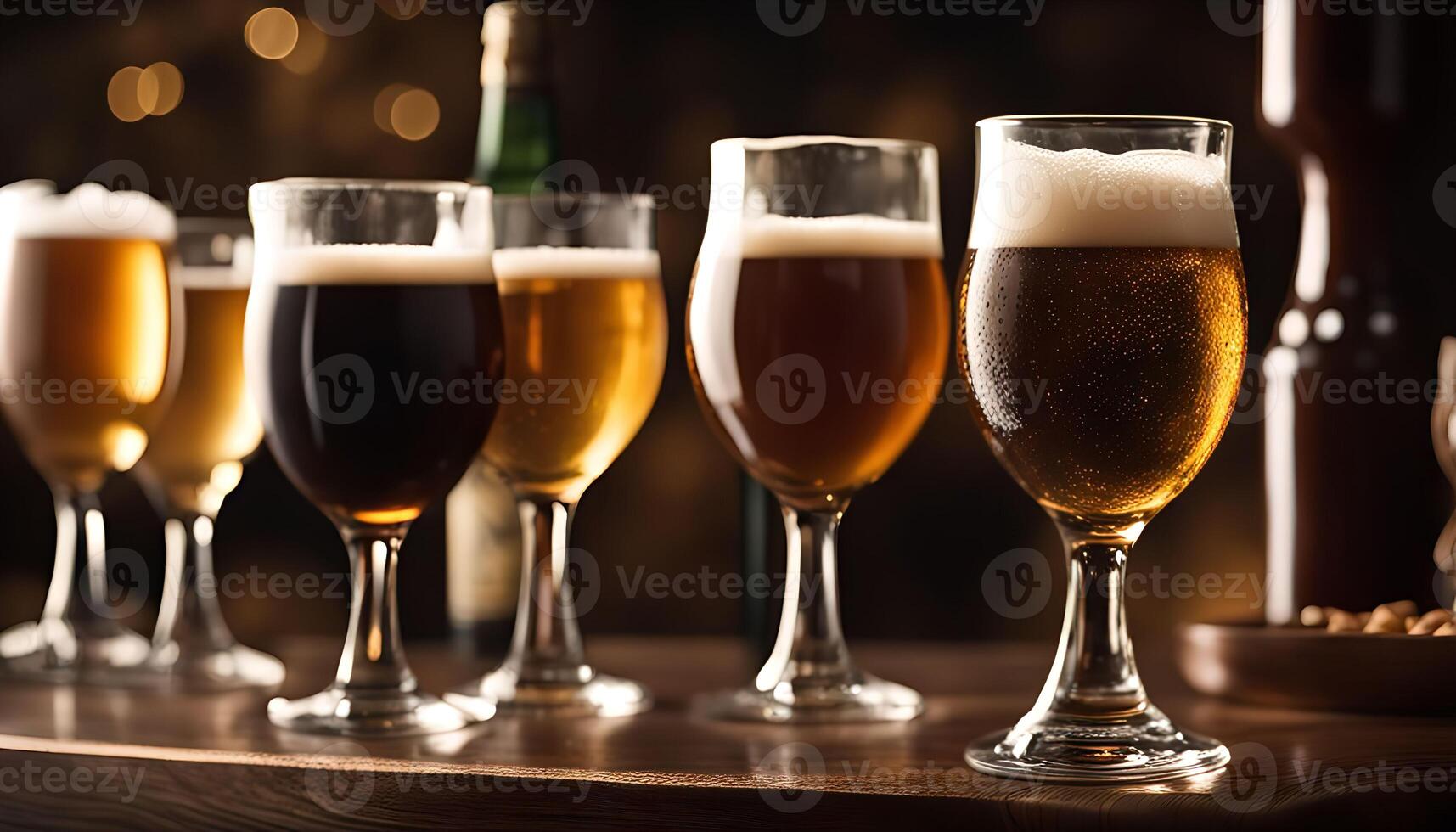Golden and Brown Beer in Glasses on a Bar photo