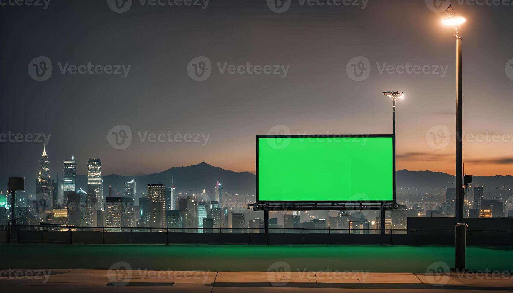 Green Screen Billboard at Night with City Skyline photo