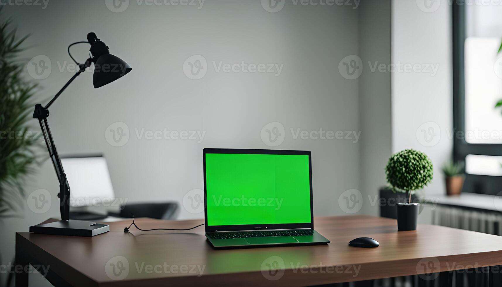 Laptop on a Desk in a Modern Office photo