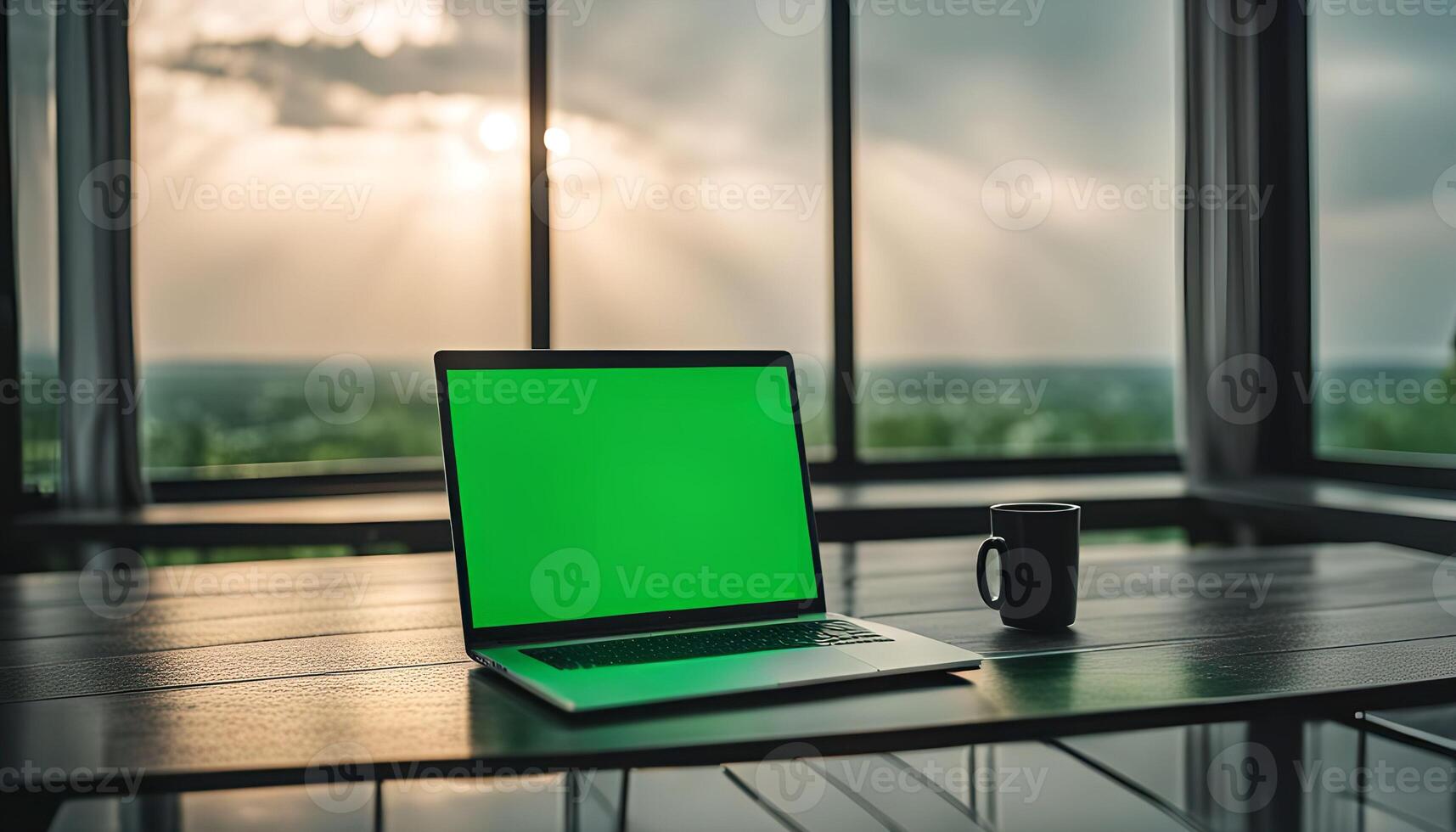 Laptop and Coffee Cup on a Table with Window View photo