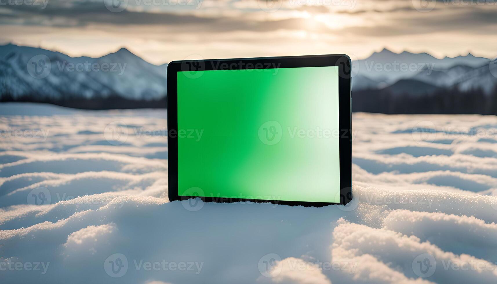 Tablet in Snowy Mountain Landscape photo