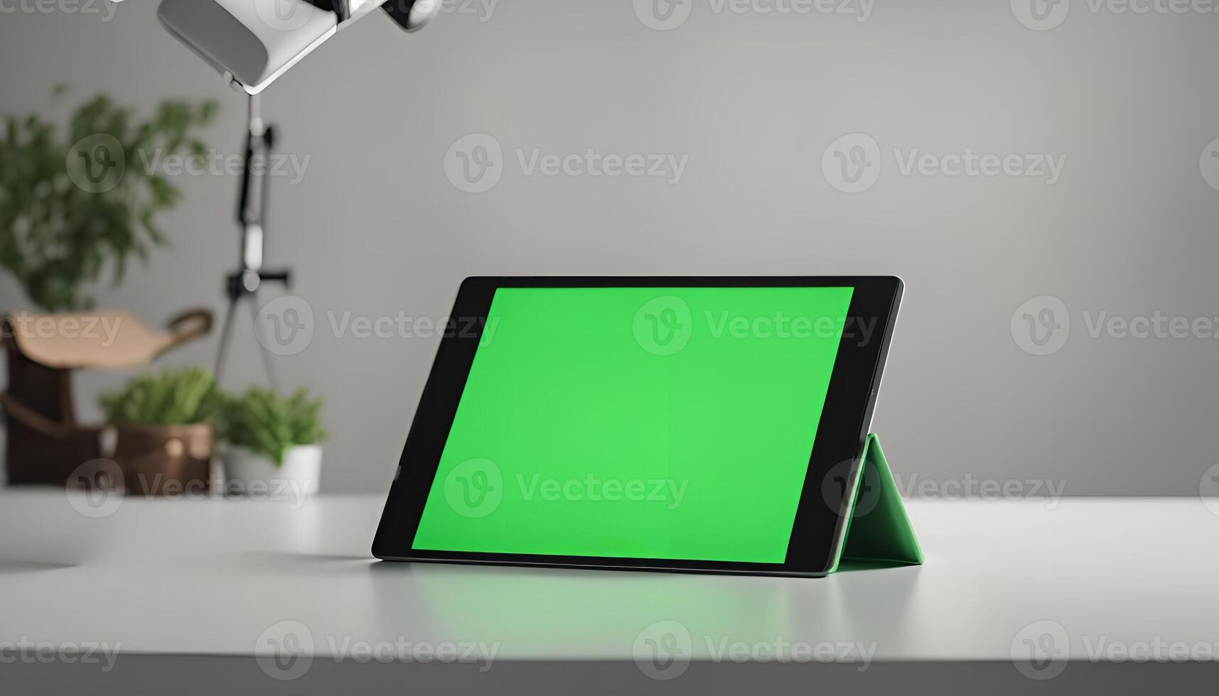 Green Screen Tablet on White Desk photo