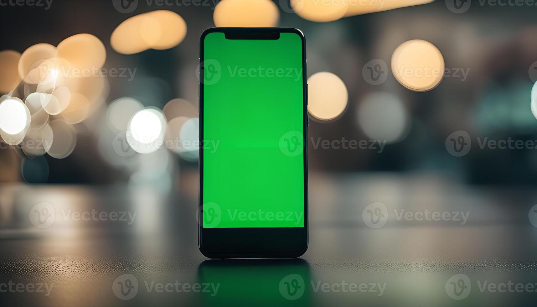 Smartphone with Green Screen in a Blurred Background photo