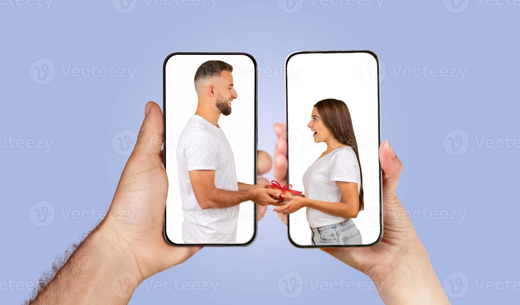 Two individuals connect through their smartphones, exchanging gifts and messages. The hands hold the phones, showcasing their loving interaction and modern communication. photo