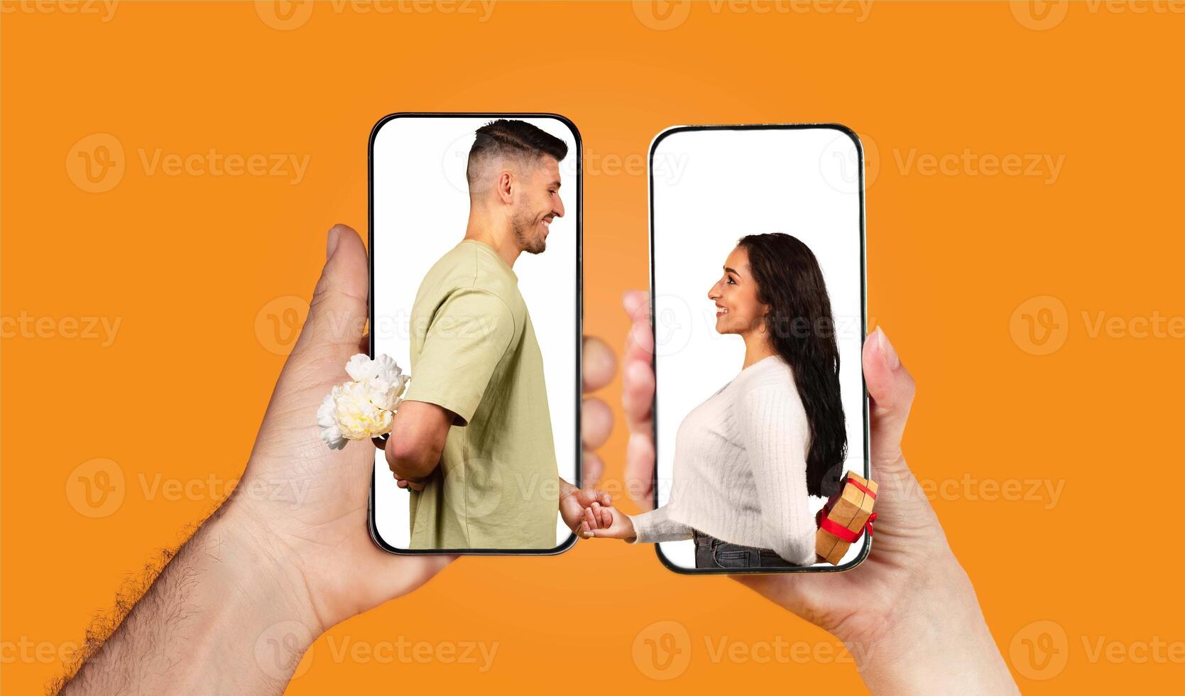 A couple shares a sweet moment through their smartphones, exchanging messages and gestures of love. Their hands are visible, holding the devices with affection. photo