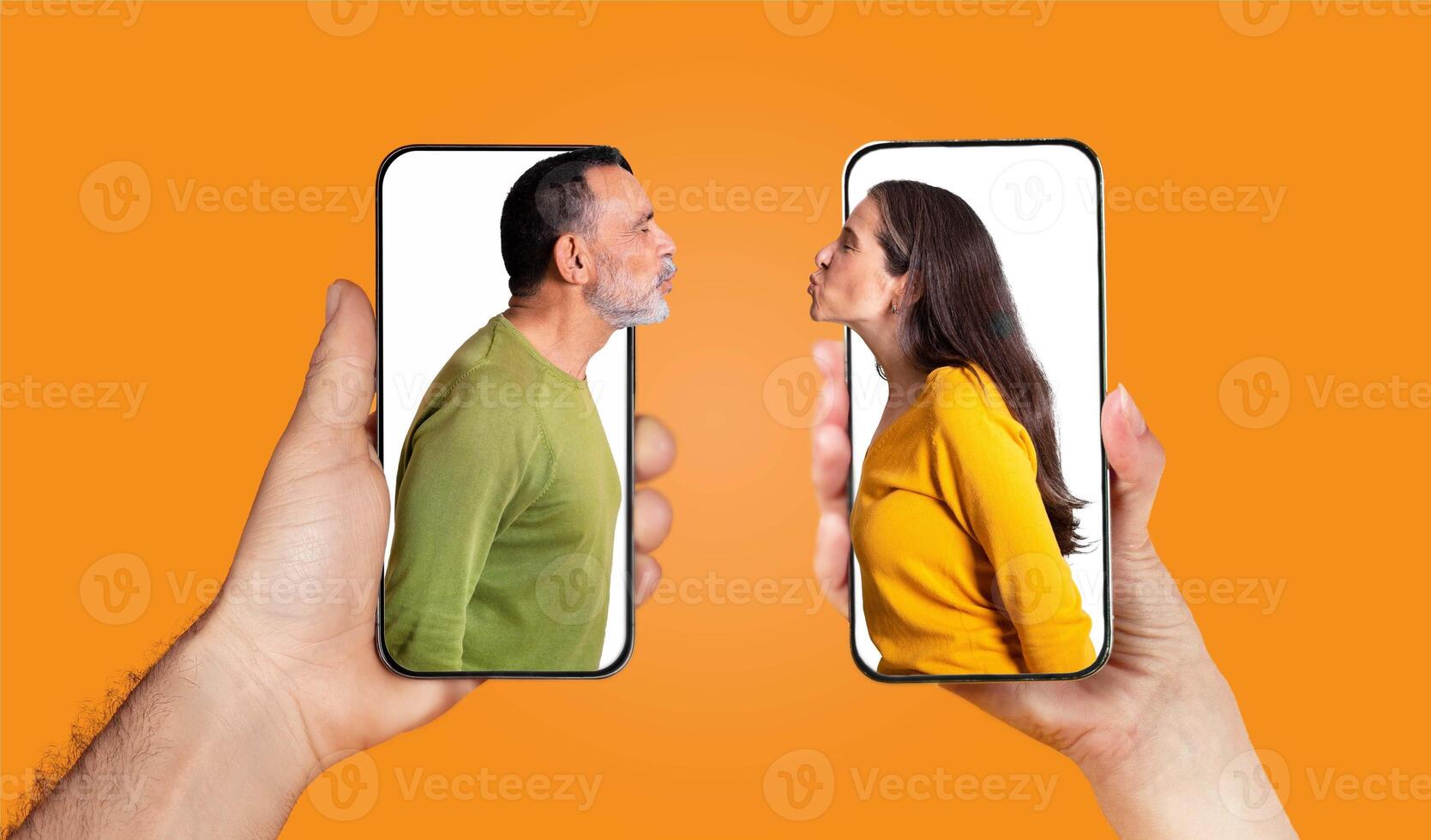 A couple holds smartphones displaying their faces, emphasizing their affection. The bright background enhances the warmth of their connection through text and messaging. photo