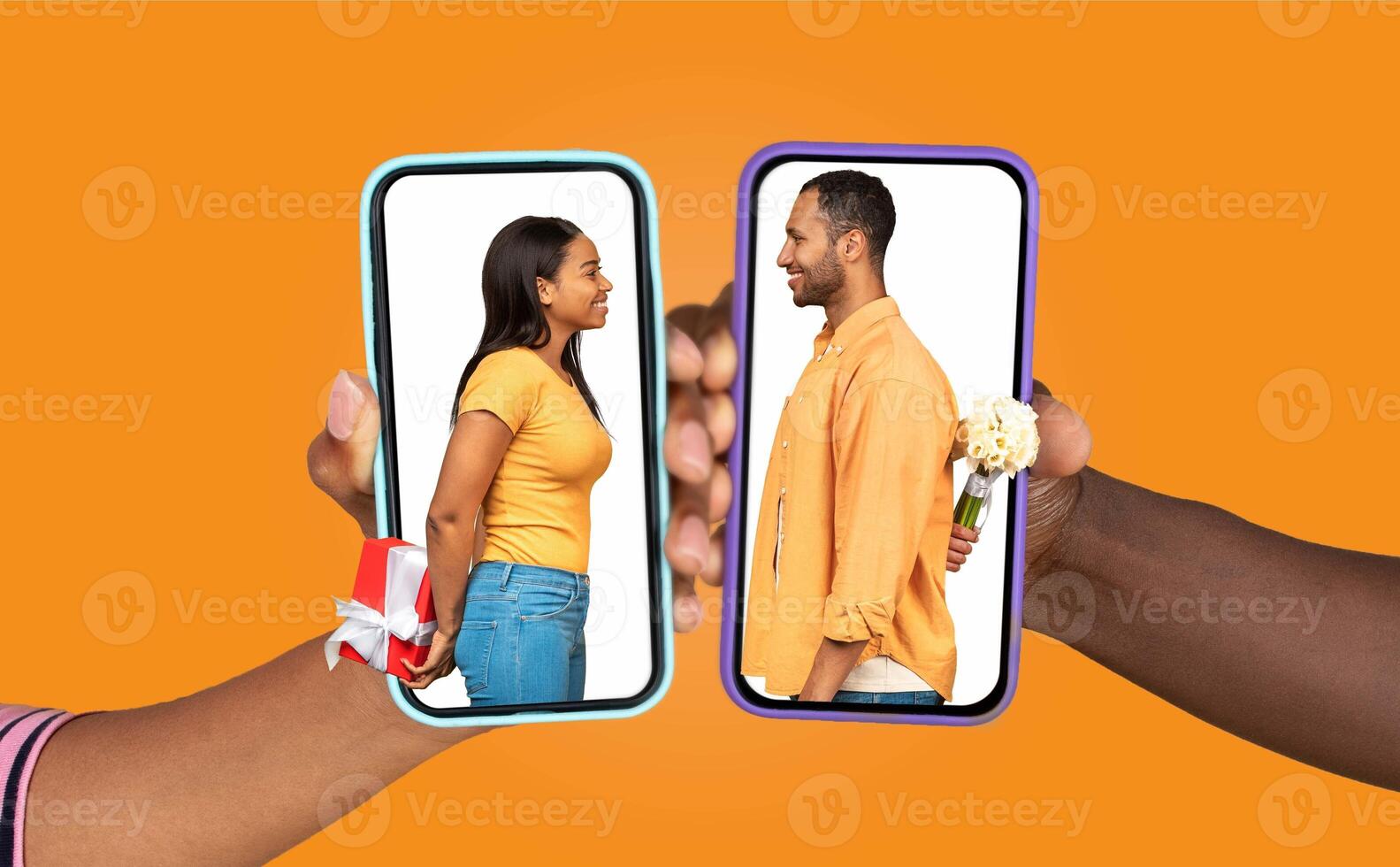 Two people are joyfully connecting through smartphones, exchanging messages. One holds a gift while the other conceals flowers, symbolizing romance and connection. photo