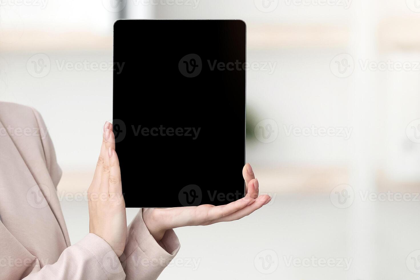 Tour Agent In Face Mask Showing Empty Digital Tablet Screen To Black Tourists Couple Offering Family Vacation Sitting In Modern Office. Touristic Agency Services And Offers. Selective Focus, Mockup photo