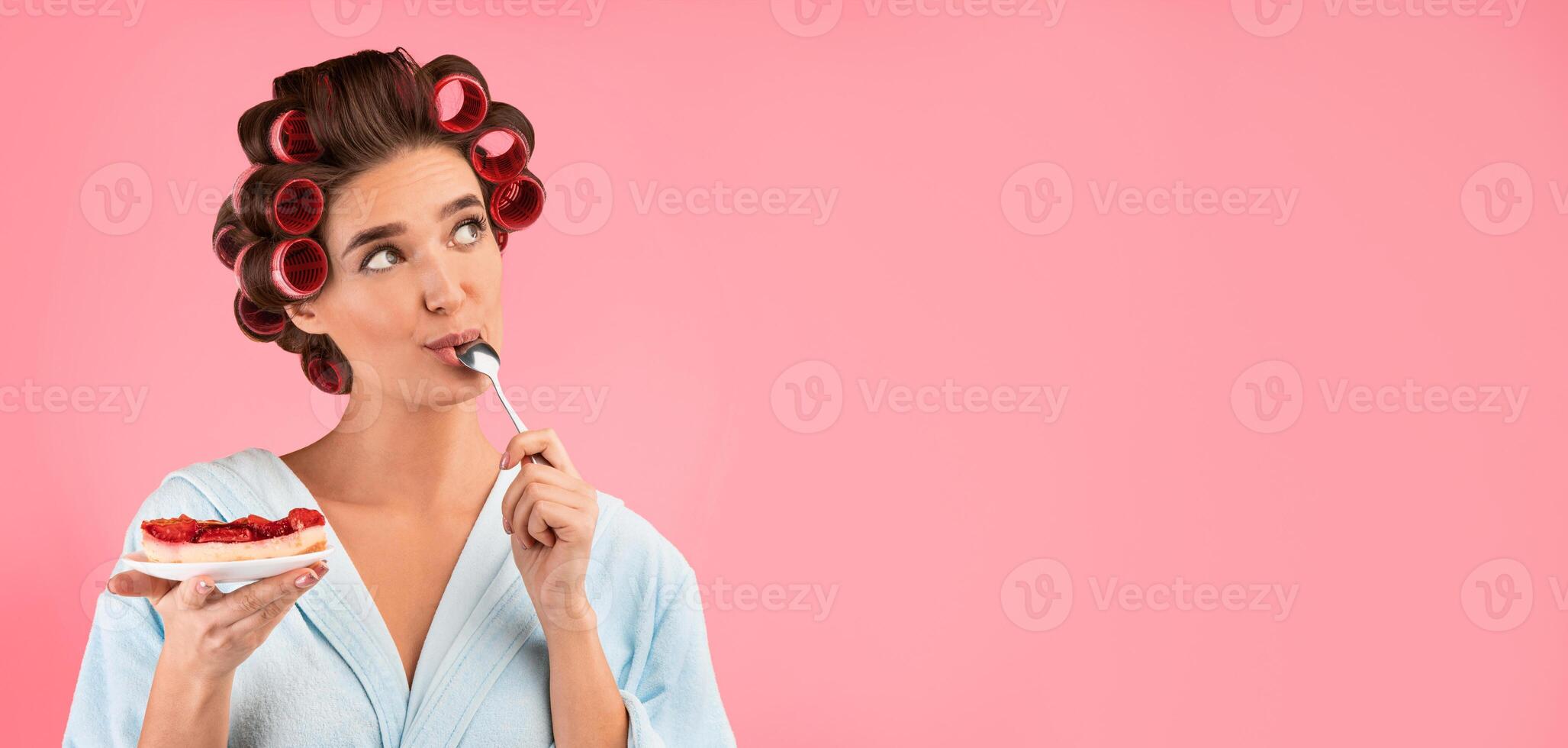 Cheat Meal And Dieting. Hungry Housewife Enjoying Tasting Cake Posing On Yellow Background. Studio Shot, Copy Space photo