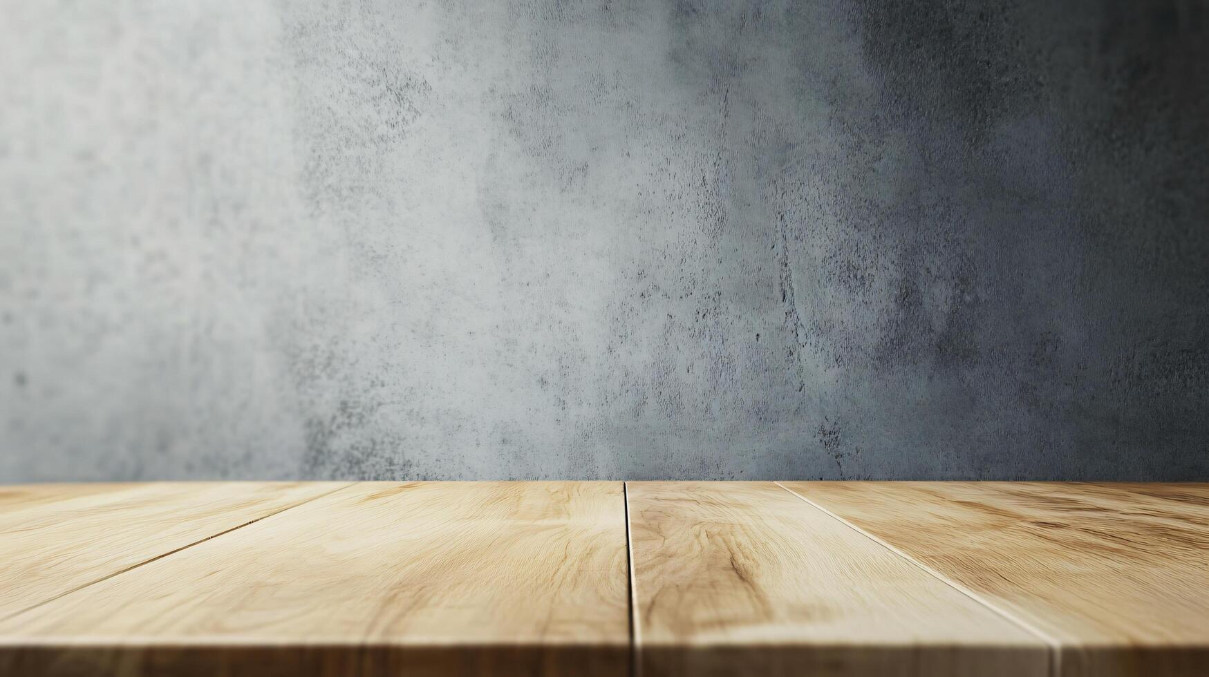 A wooden table with a grey wall behind it photo