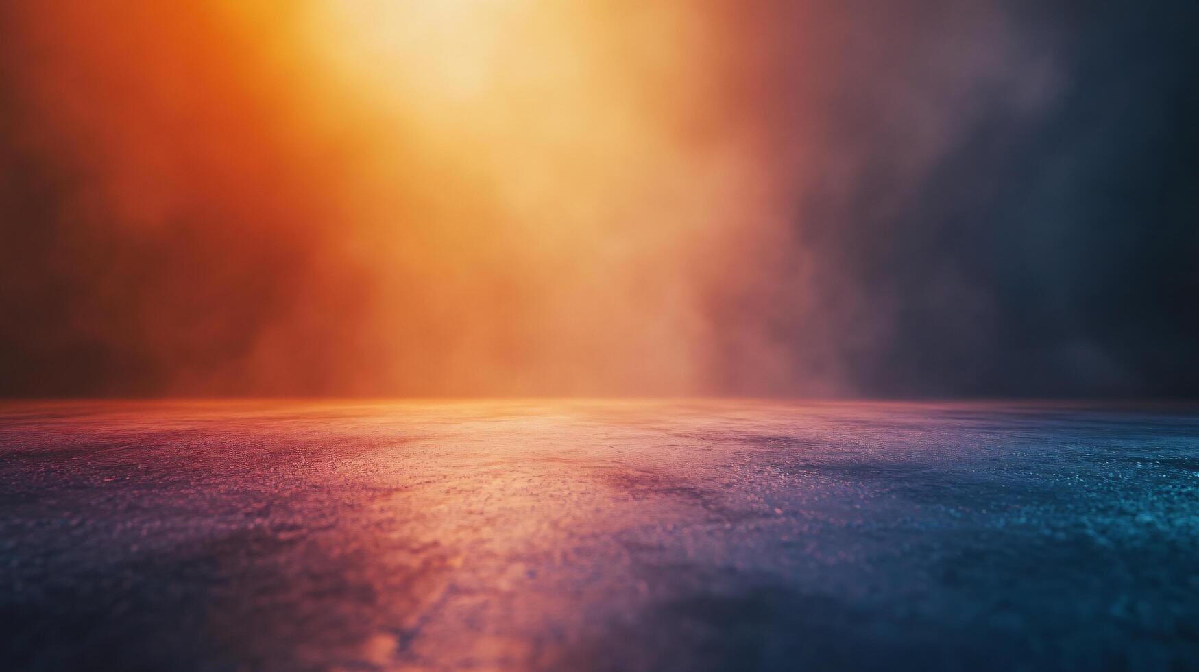 A blurry image of a road with a bright orange and blue sky in the background photo