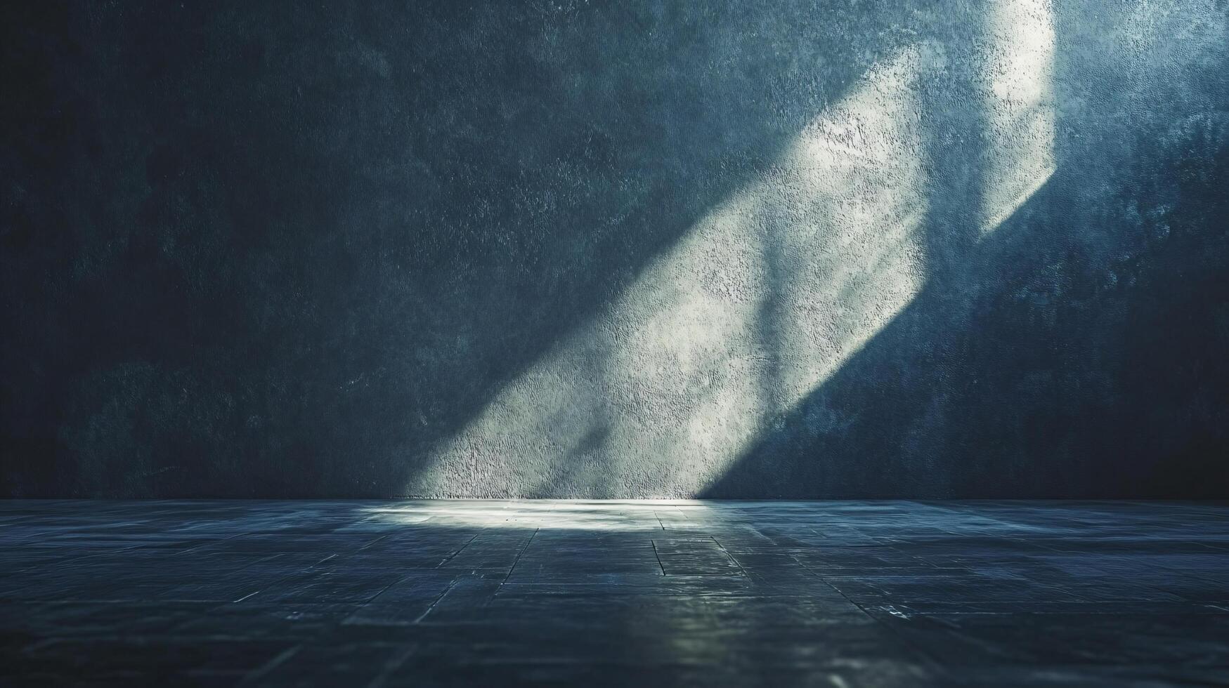A dark room with a window that is letting in light photo
