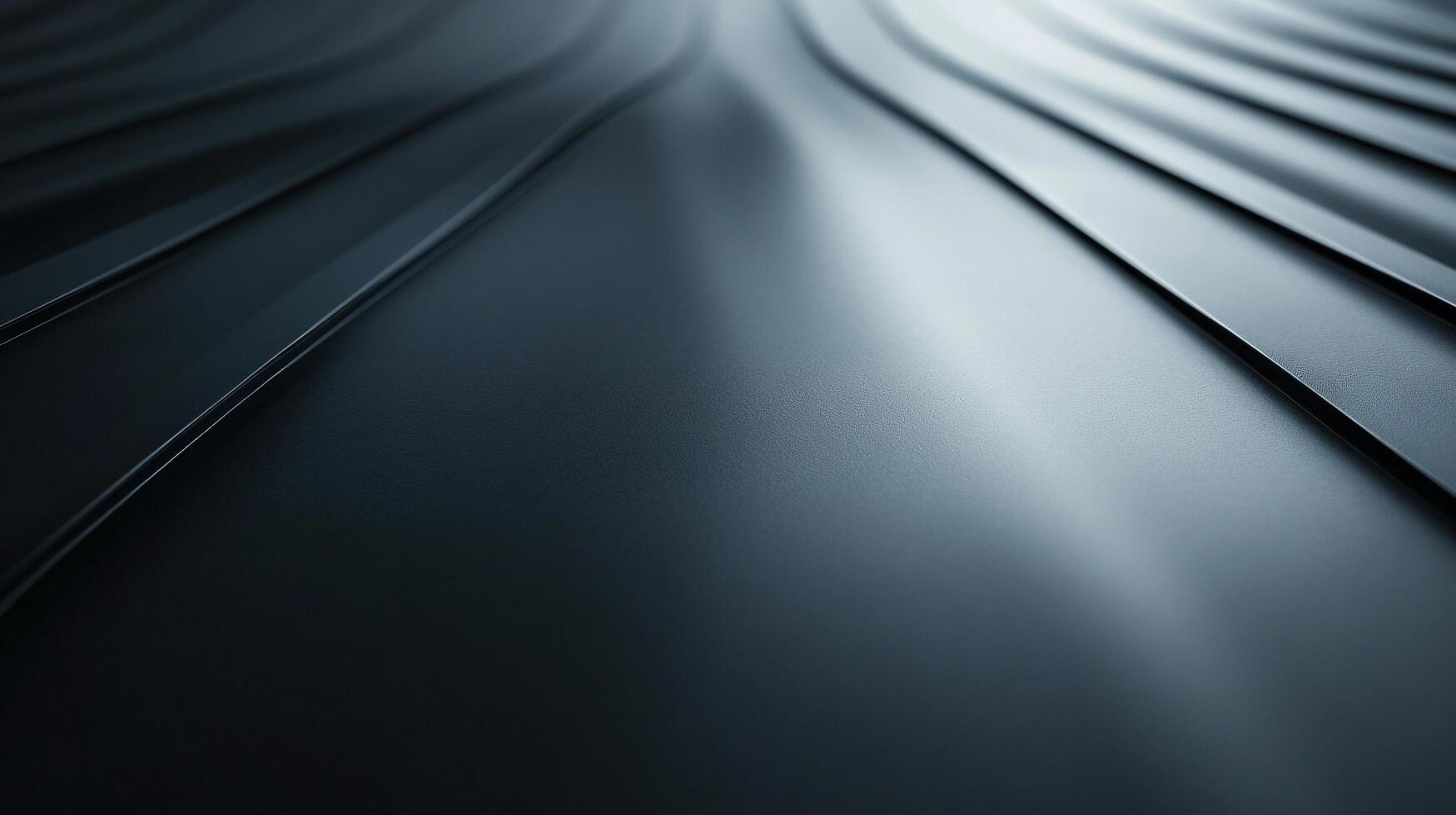 A black and white photo of a wave with a silver color