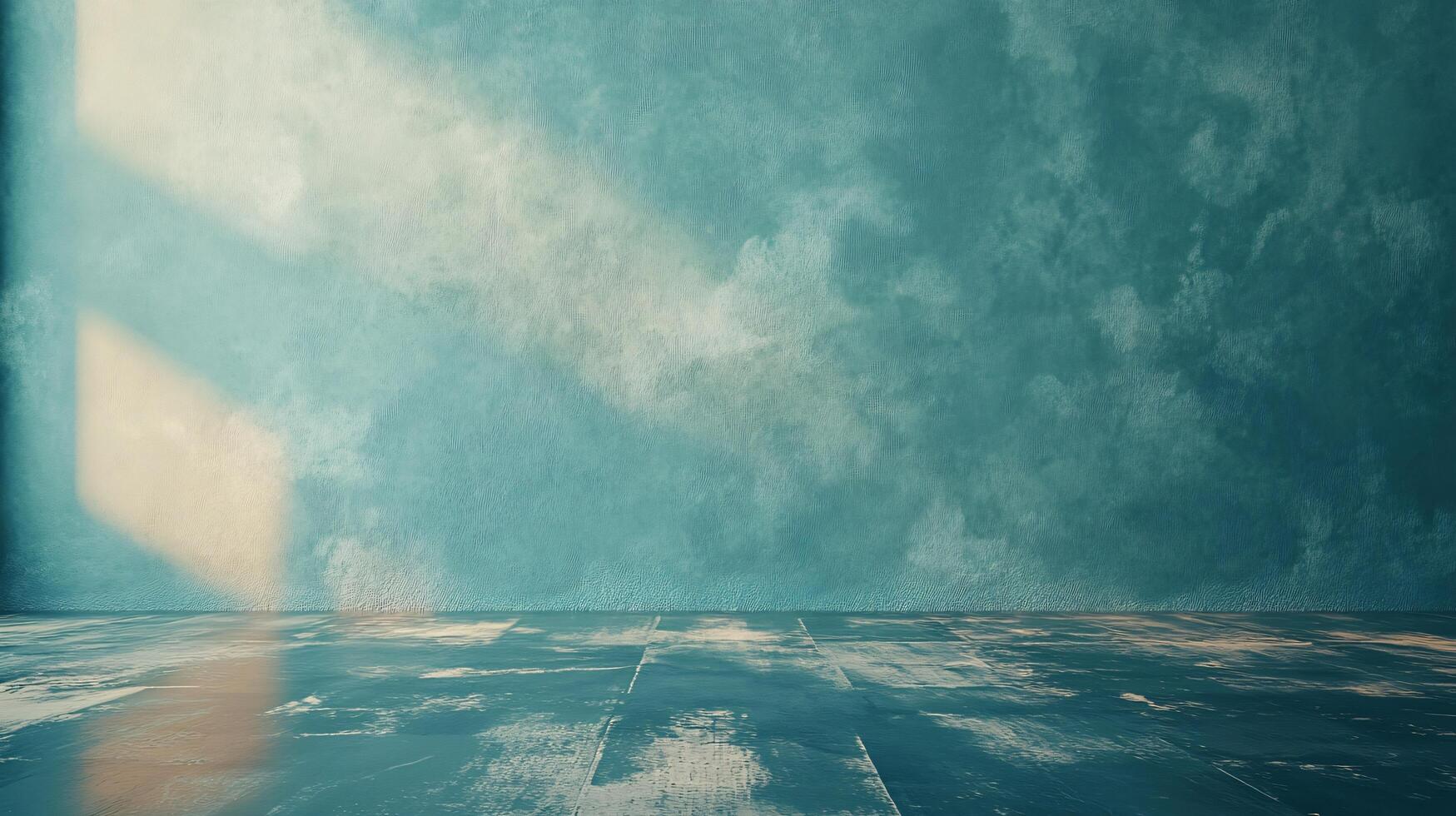 A large, empty room with a blue wall and a window photo