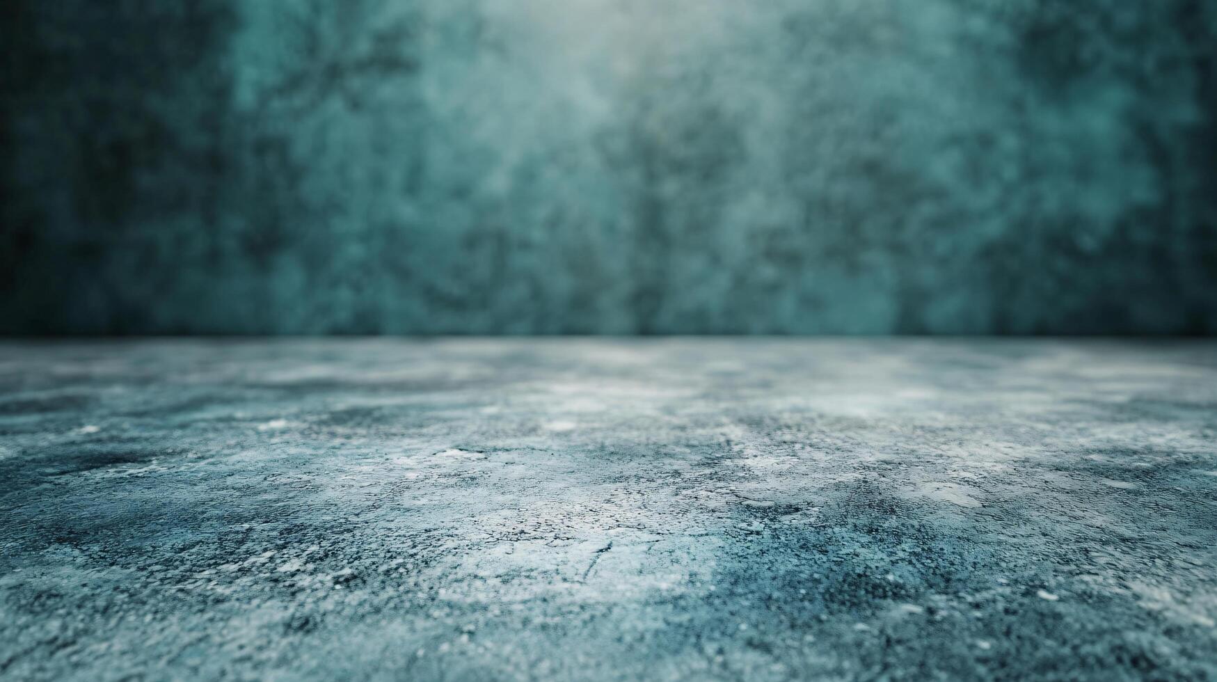 A blue wall with a grey floor photo