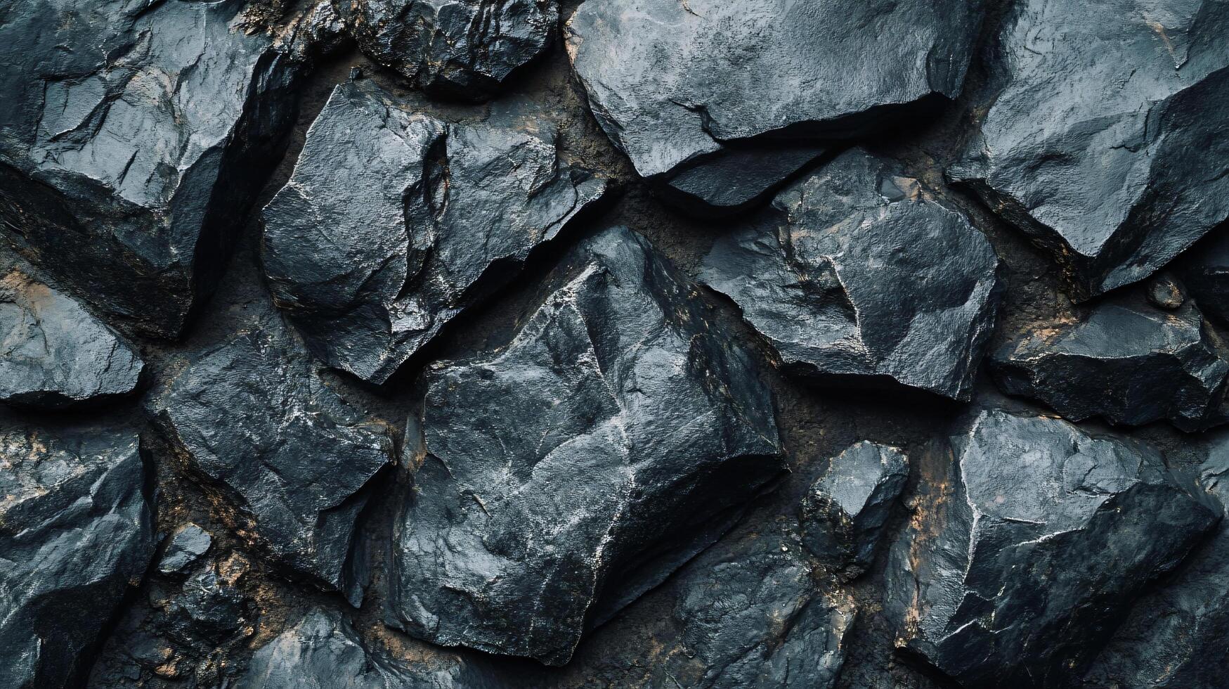 A close up of a rock wall with a lot of rocks photo