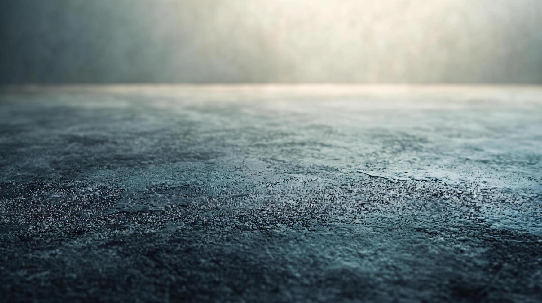 A grey and blue background with a few specks of white photo