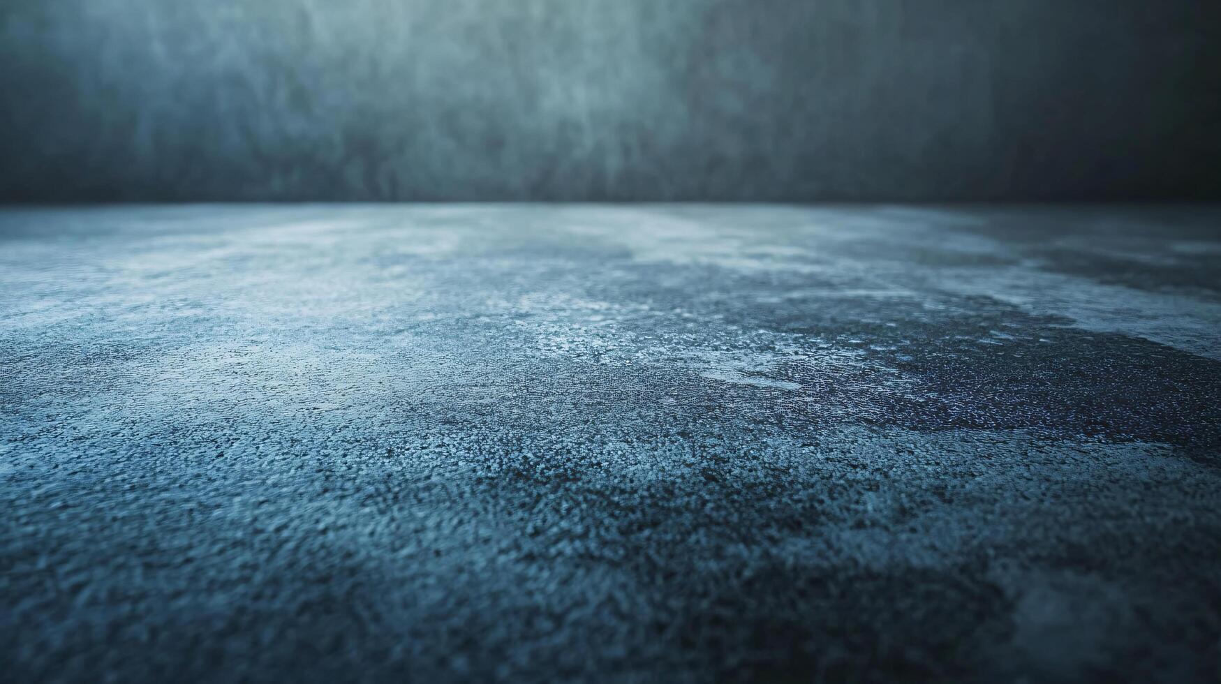 A blue and grey background with a white spot in the middle photo