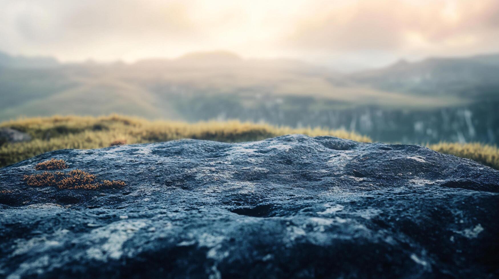 A rocky hillside with a blue sky in the background photo