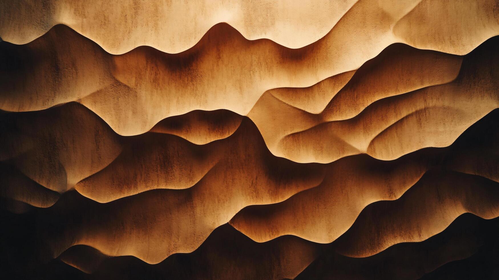 The image is a close up of a mountain range with a brown and tan color scheme photo