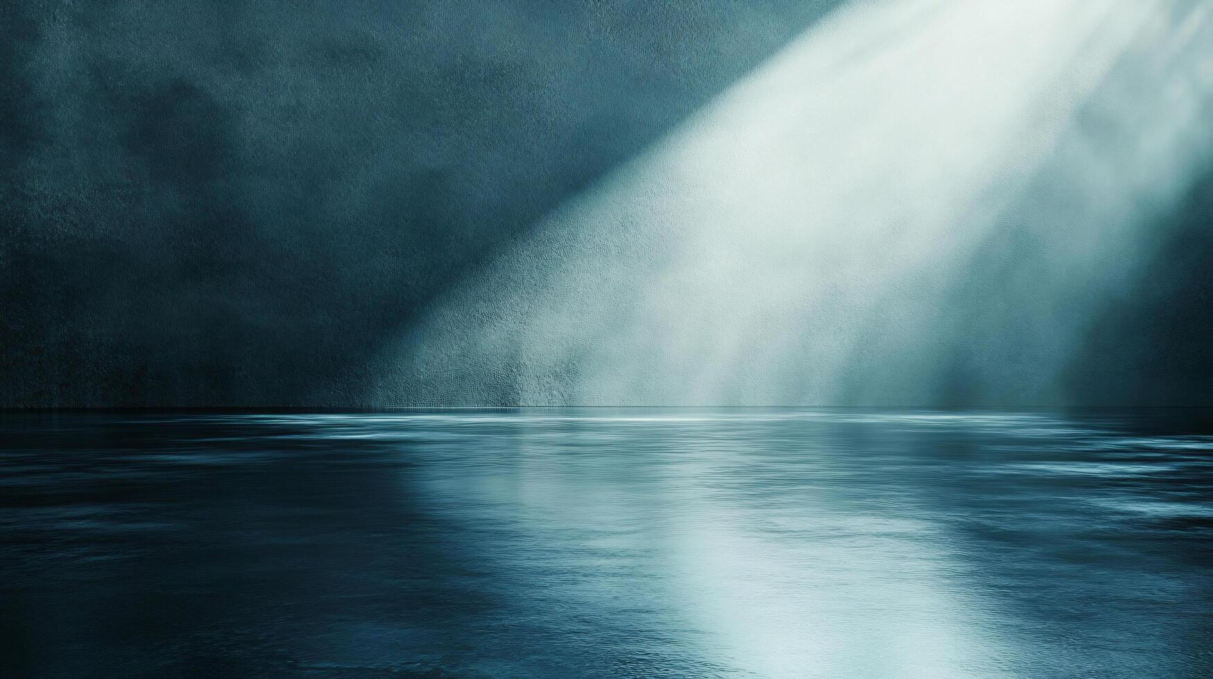 A dark blue room with a large body of water in the background photo
