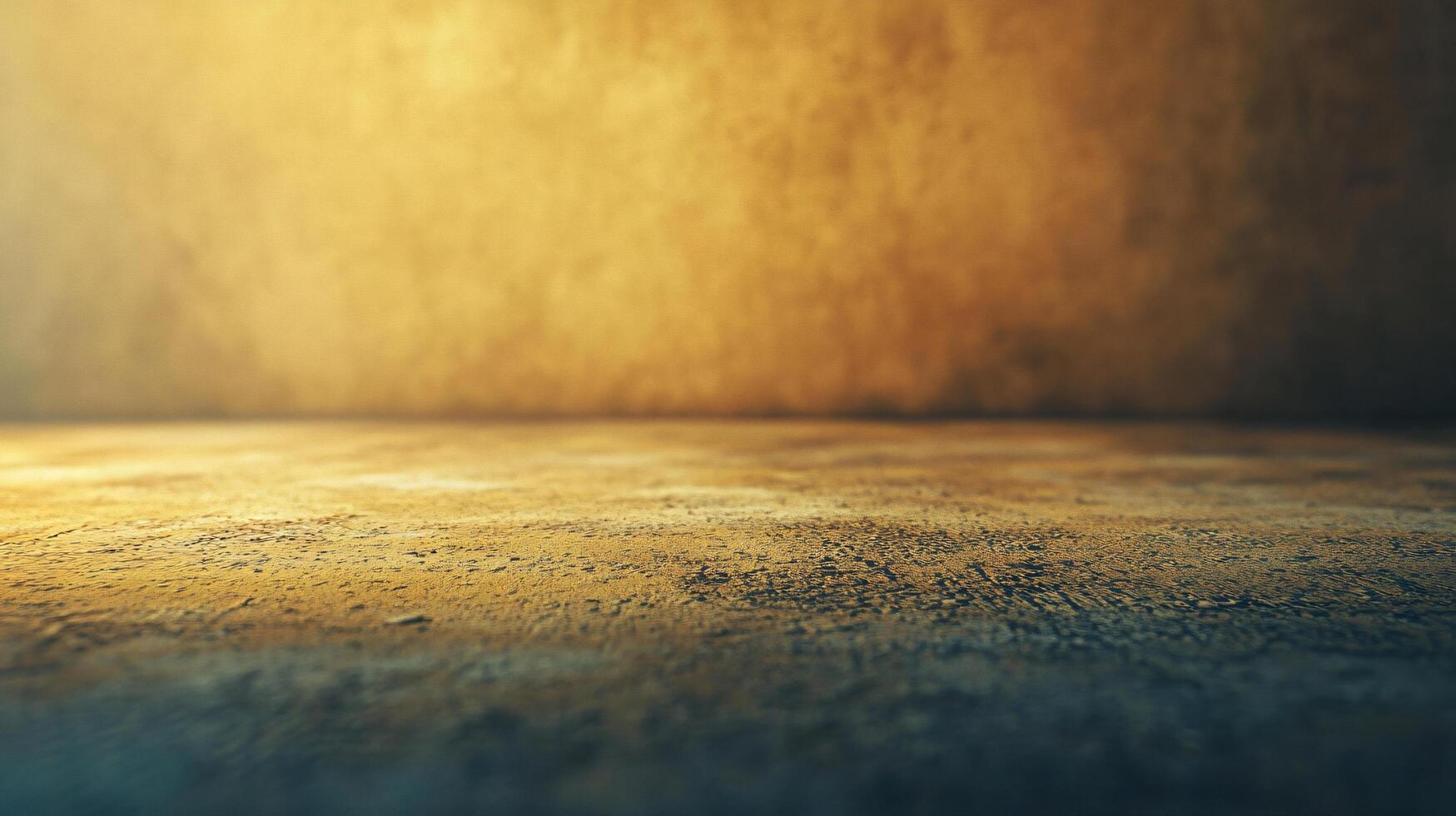 A large empty room with a tan wall and a blue floor photo