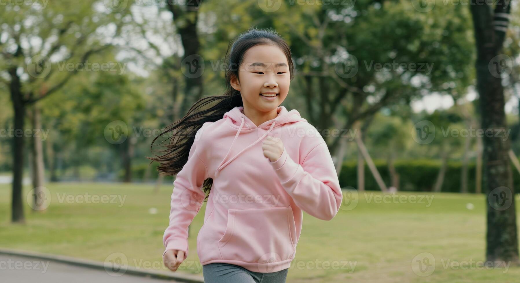 Young asian girl enjoying a run in a peaceful park setting during a refreshing morning photo