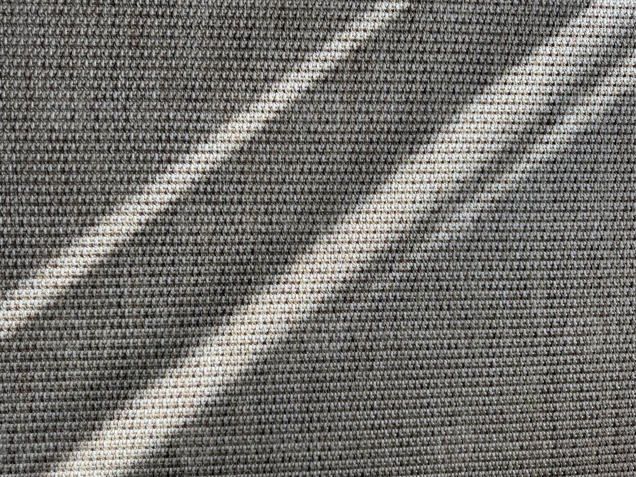 Textured fabric with light reflections creating patterns in the afternoon photo
