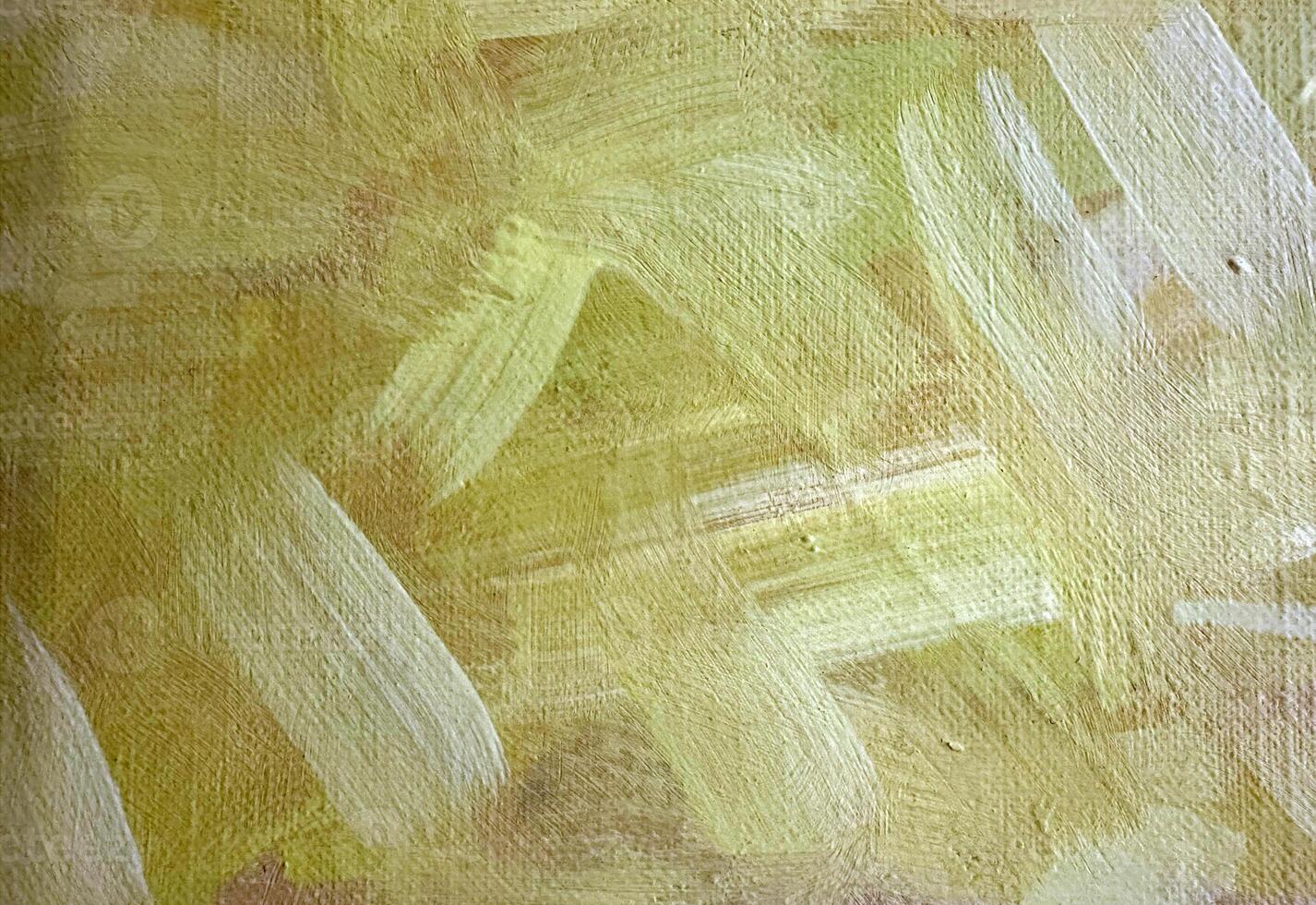 Abstract painting with yellow and white brush strokes on canvas in bright hue photo