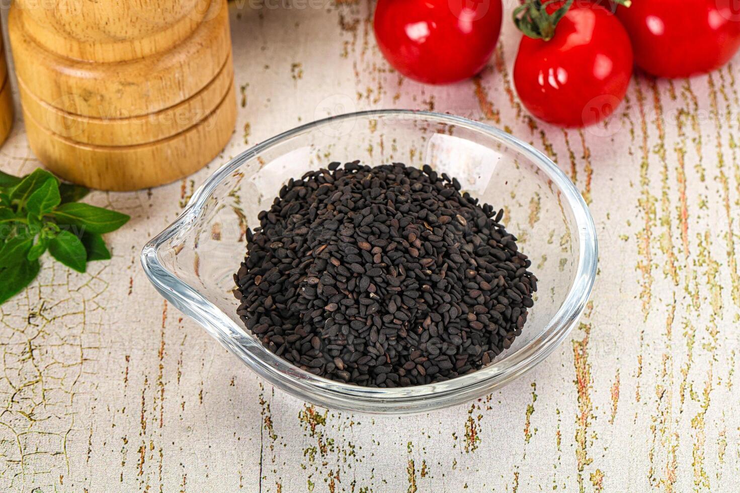 Black sesame seeds in the bowl photo