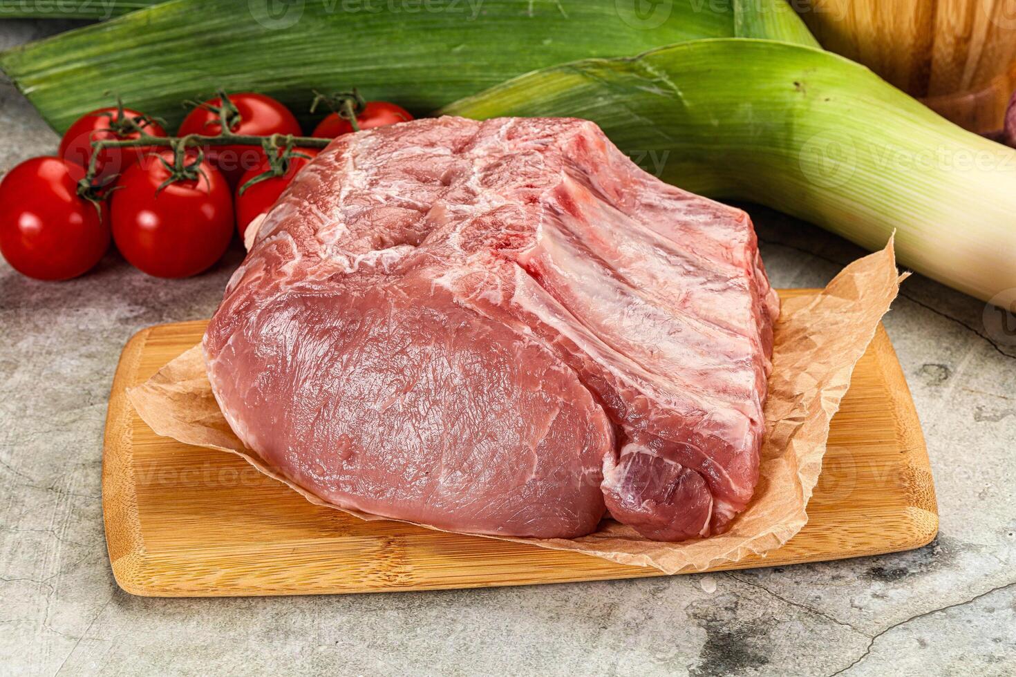 Raw pork loin cut with bone photo