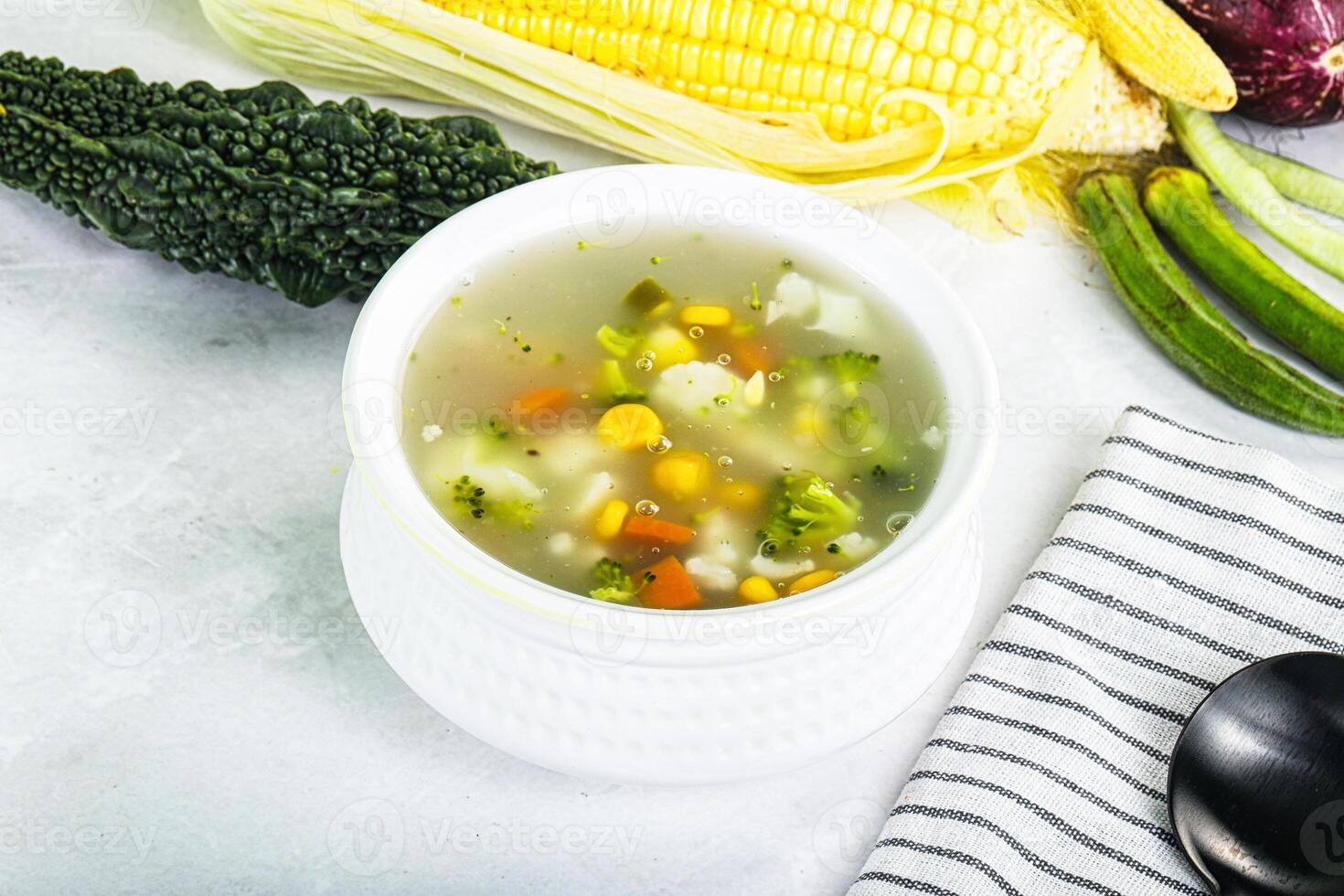 Soup with corn and broccoli photo