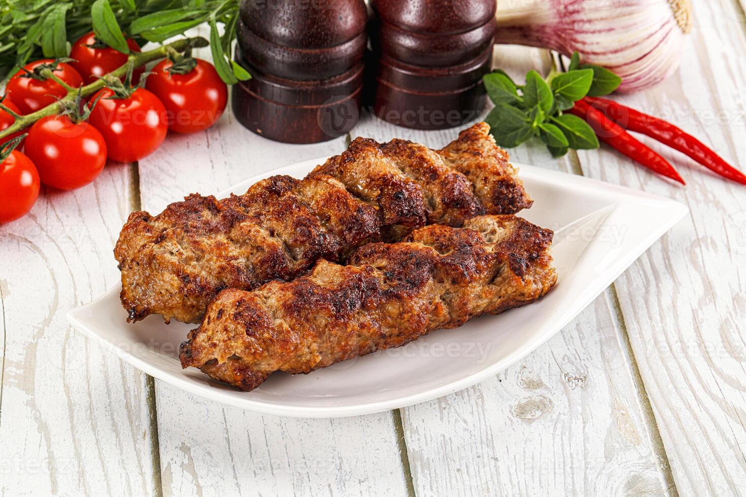 Chicken kebab minced meat and spices photo