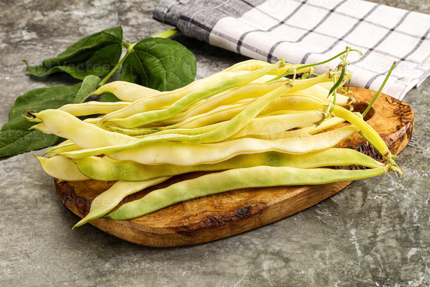Raw green bean strings heap photo