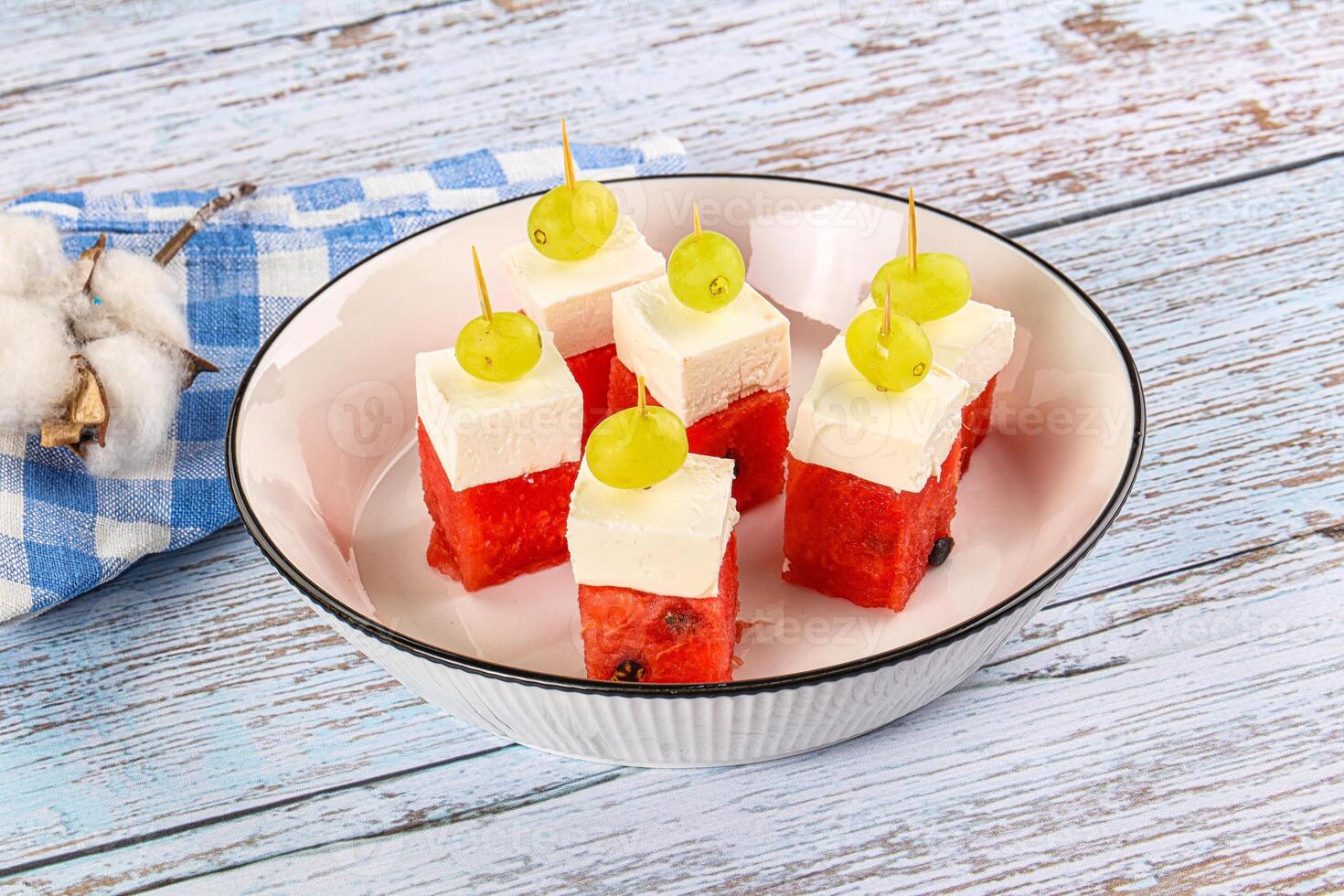 Watermelon with feta and grape photo