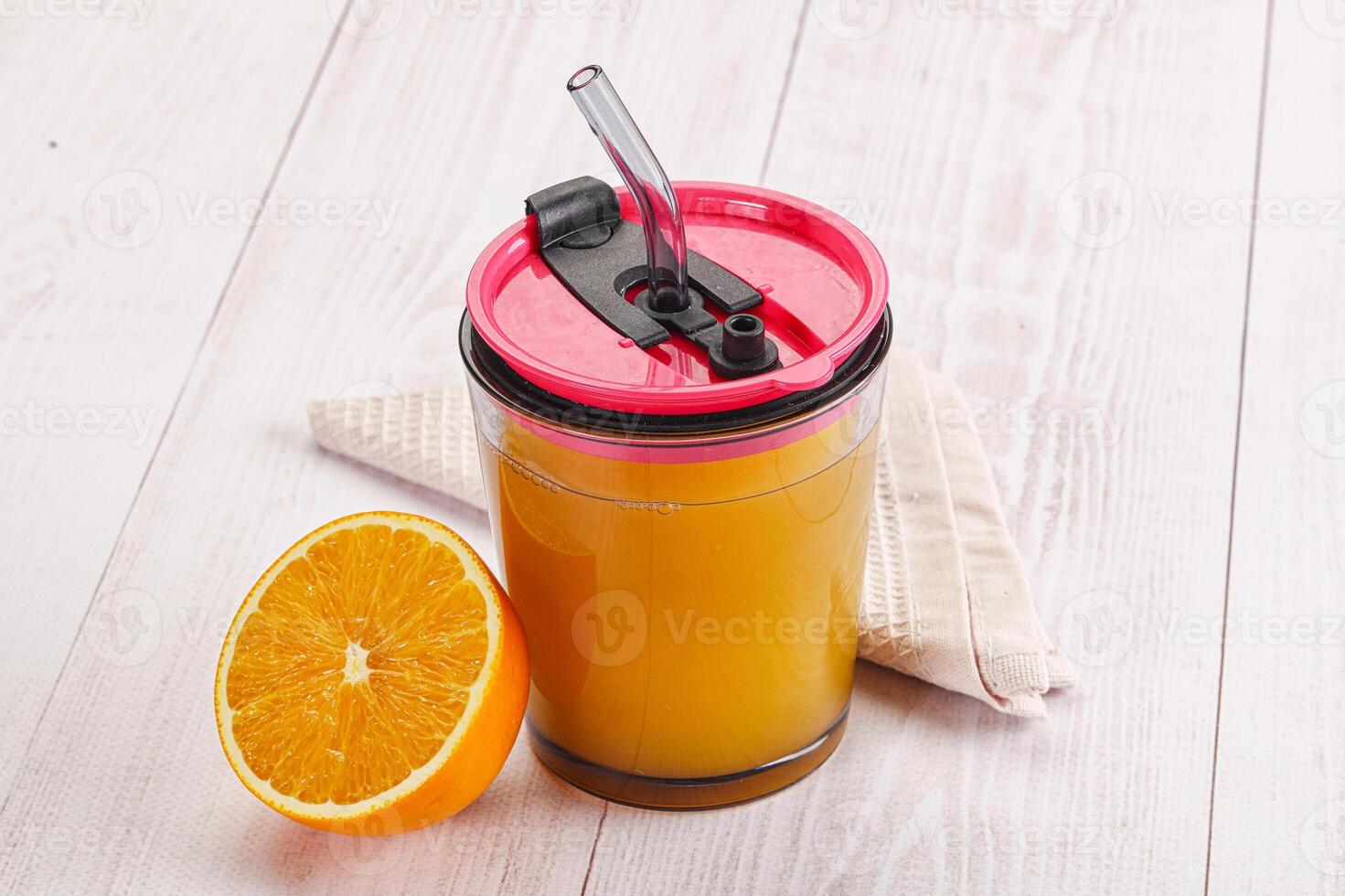 Sweet fresh orange juice in the glass photo