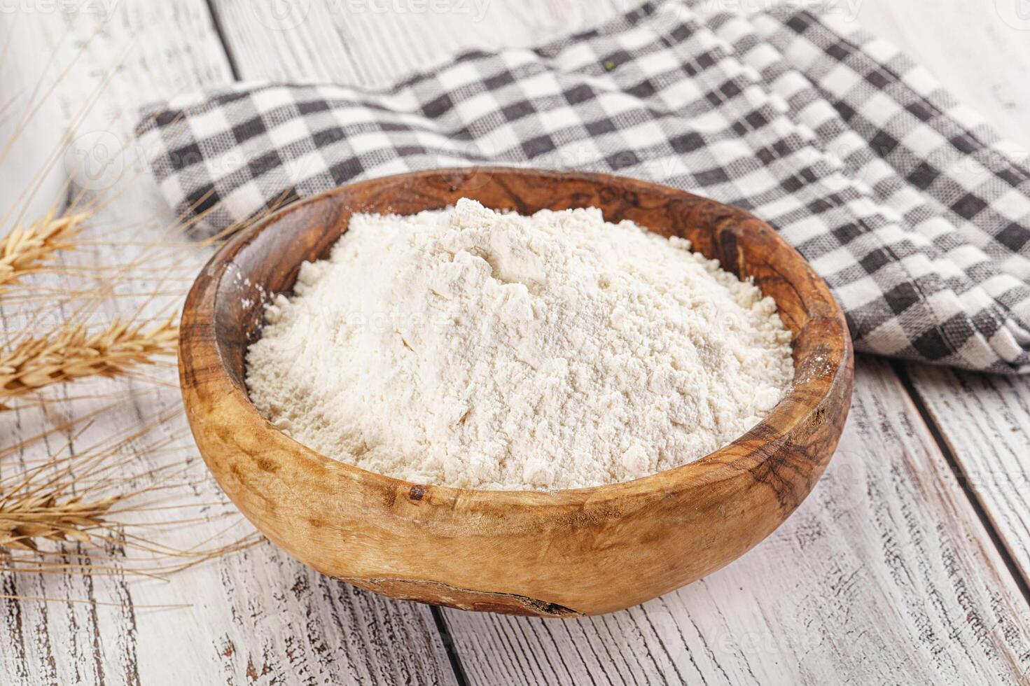 Wheat flour heap for bake photo