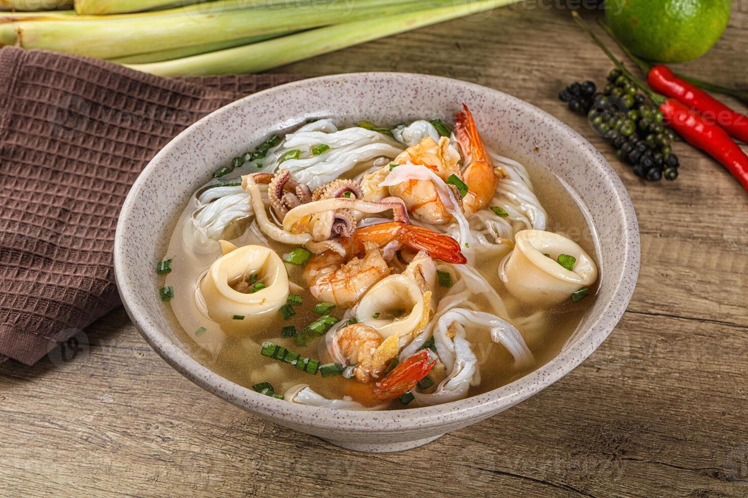 Vietnamese Pho Bo soup with seafood photo