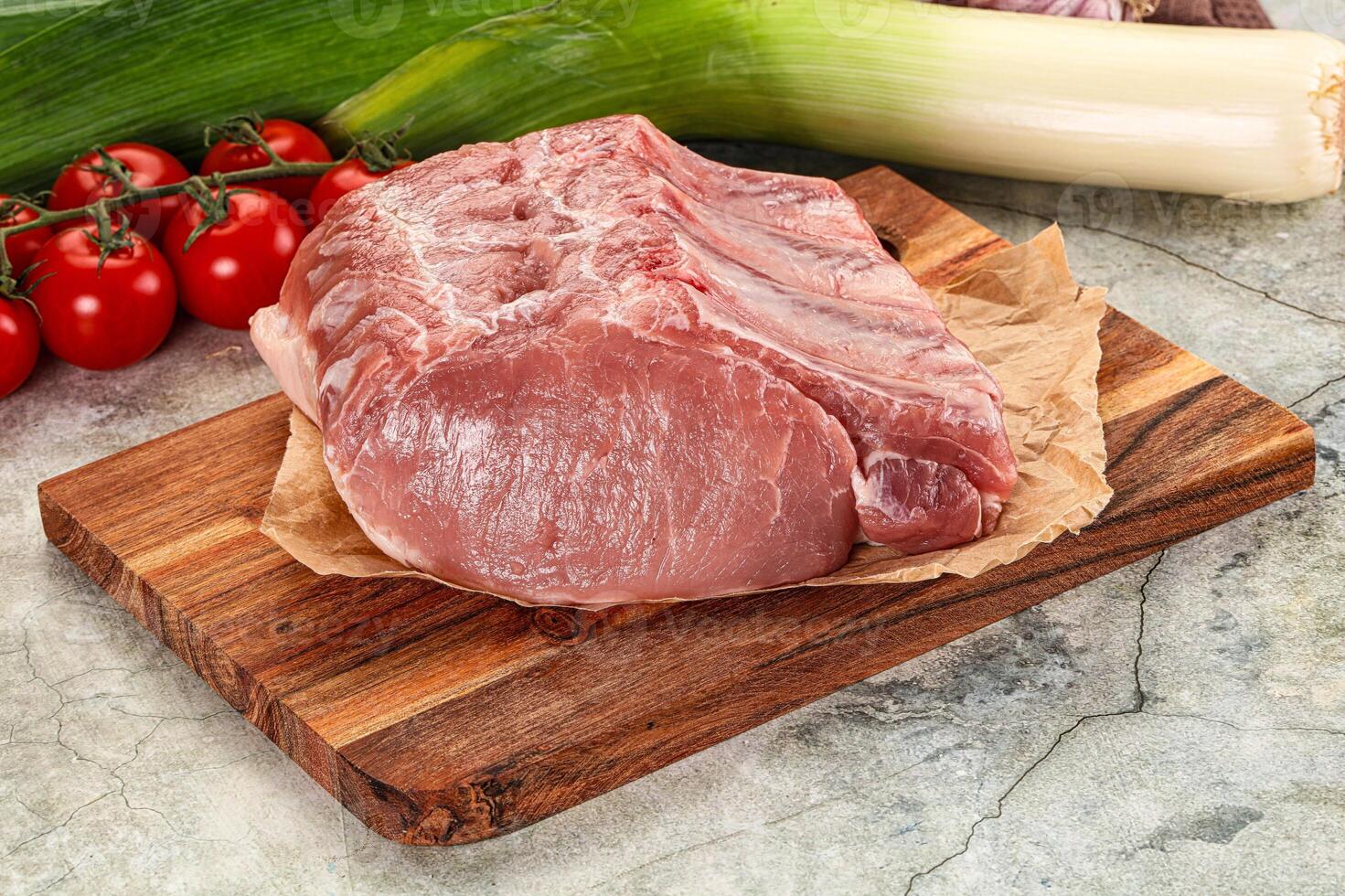 Raw pork loin cut with bone photo