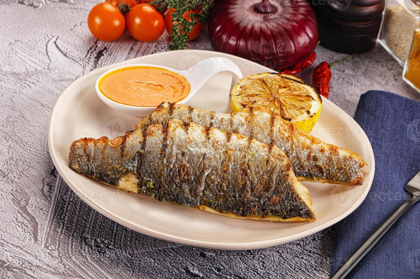 Grilled seabass fillet with lemon photo