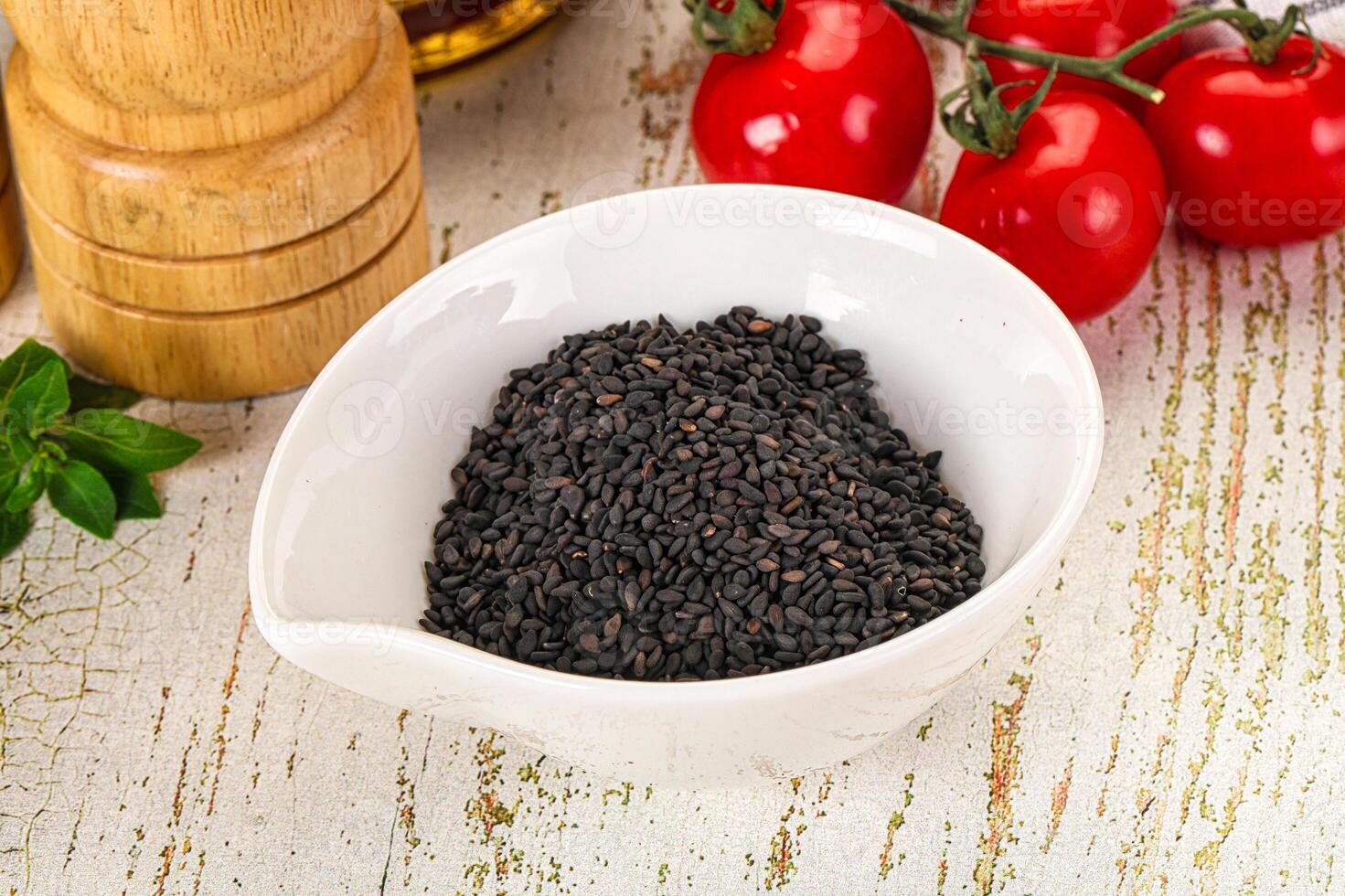 Black sesame seeds in the bowl photo