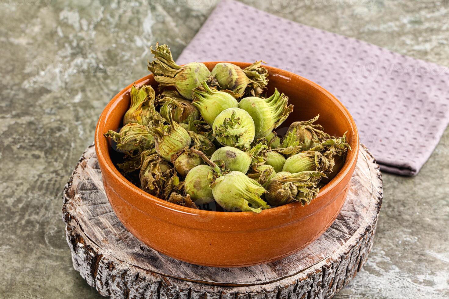 Fresh green ripe hazelnut heap photo