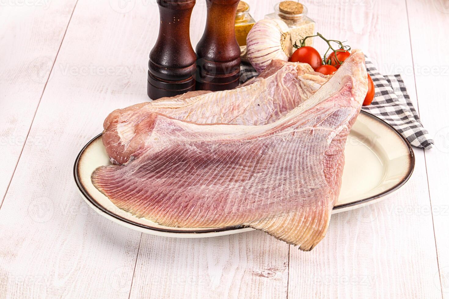 Raw uncooked stingray fish wing photo
