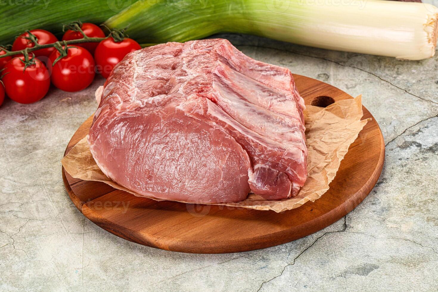Raw pork loin cut with bone photo