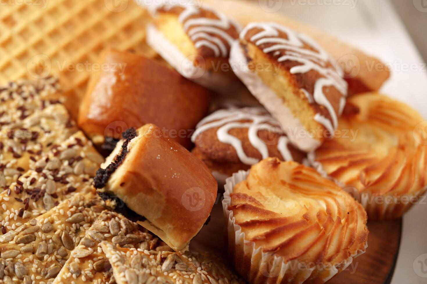 Delightful assortment of traditional pastries and sweets arranged artfully on a platter photo