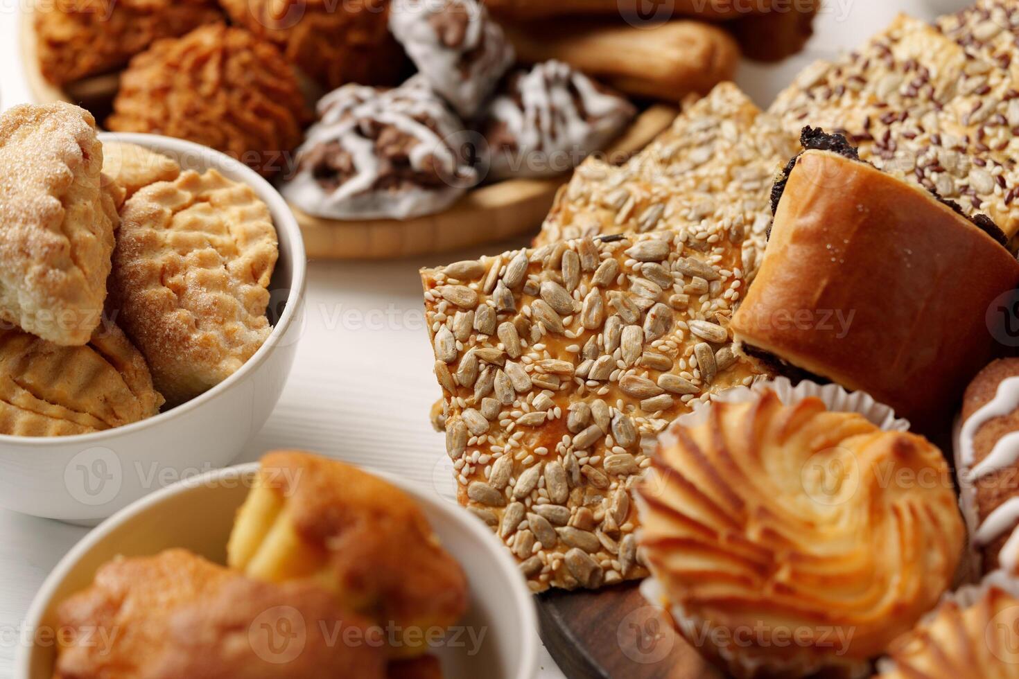 Delicious assortment of bakery treats displayed on a table at a festive gathering photo