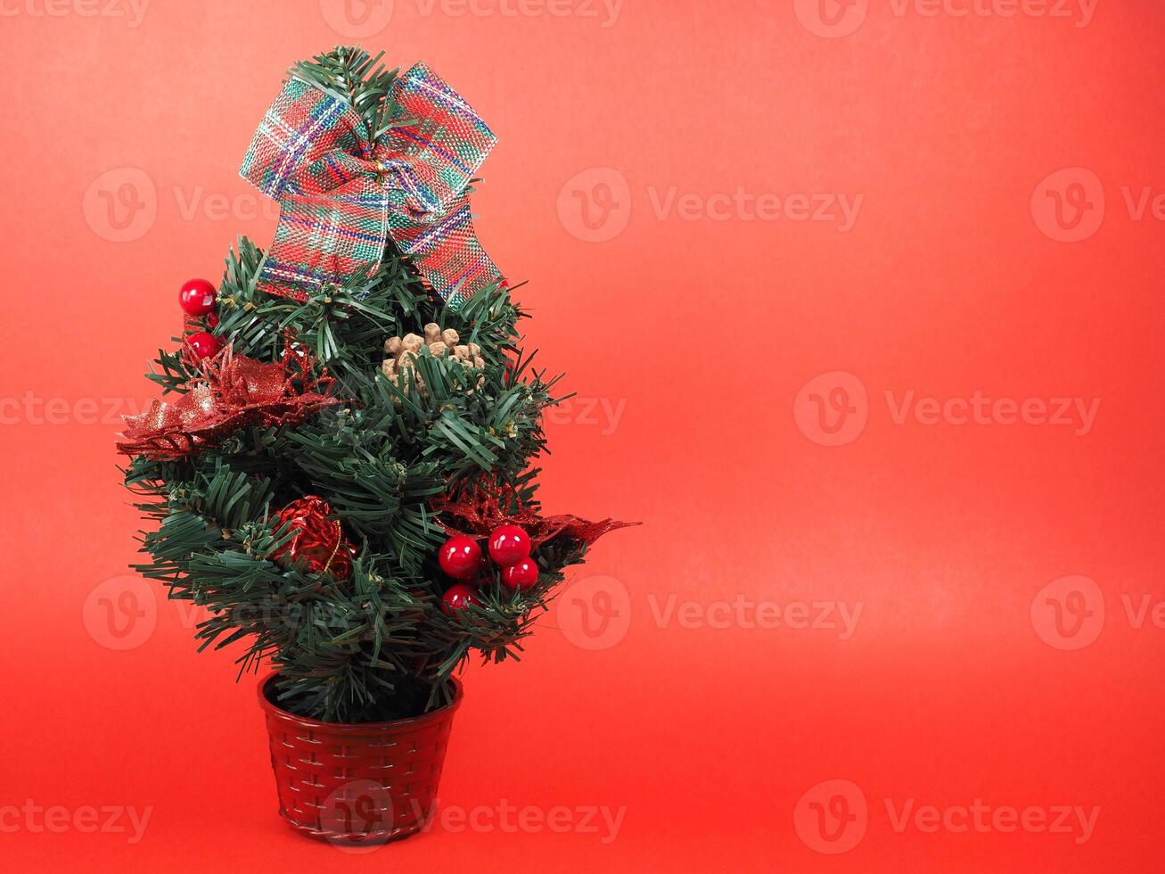 christmas tree over red background photo